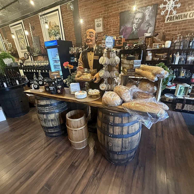 ghigerris interior display table with olive oils and local breads